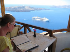 Melanie looks over the menu from high on the mountain top.