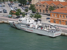 The Guardia Costeria!  I'm thinking it's the Coast Guard!