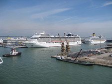 We're almost to the dock -- notice a tugboat has been pulling us through the skinny pathways in Venice!  Well, skinny for a huge cruiseship anyway!