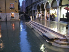 This photo is really cool.  The stairs just disappear into the canal.