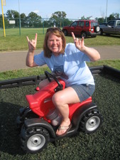 Rock ON in the kiddie playground, Amy!