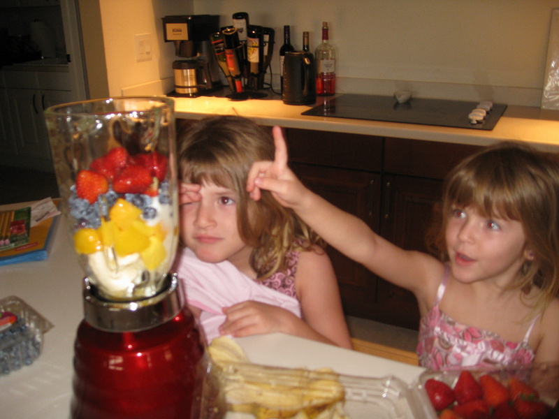 Hey Paige, look, strawberries, blueberries, mango, bananas and organic yogurt!  Yummy!