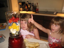 Hey Paige, look, strawberries, blueberries, mango, bananas and organic yogurt!  Yummy!