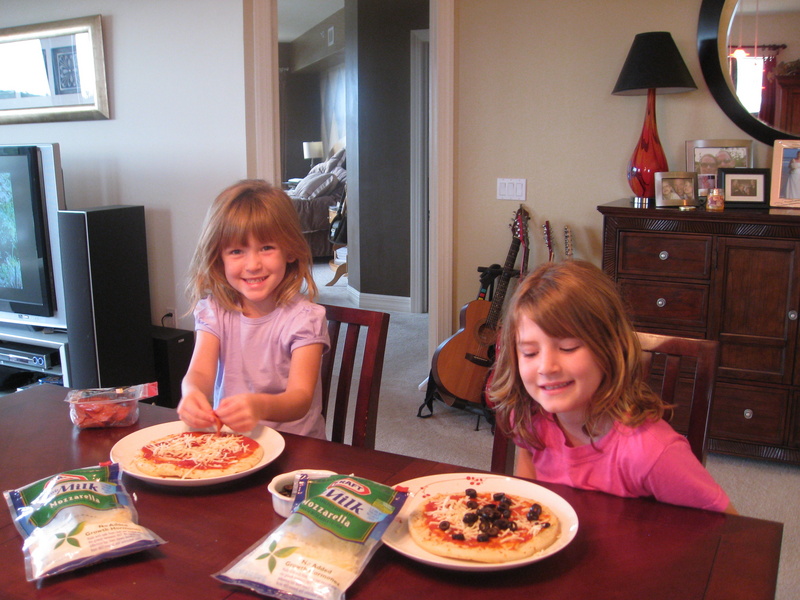 Today (10/5), we decided to make our own healthy pizzas using Whole Wheat crusts and fresh vegetable toppings (along with organic tomato sauce!)  They came out delicious!