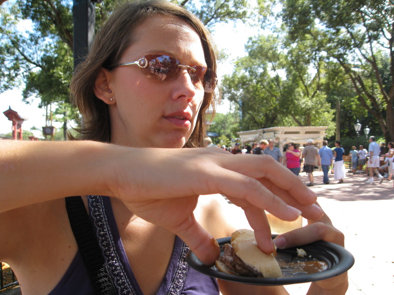 ...then you get your drink (matched to your food by Disney's Sommeliers) and test it out!  Here Jen tries a Lamb Slider from New Zealand!