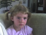 Paige-E with pony tails (concentrating on the TV!)