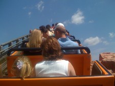 The next day, we went to Magic Kingdom, and rode a bunch of rides.  Here's Grammy K and JoJo, Kate & Jesse sitting in front of us on Big Thunder Railroad.