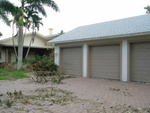 Minor damage to the left garage door - a tree branch flew into it at 70+ mph.