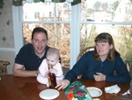 Charly2 & Tara watch Paige as she tries to drink an Arizona Ice Tea.