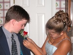 Homecoming 2003 - Lauren puts on Adam's Boutonniere.