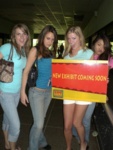 the girls showing that there is a new exhibit coming soon.... ahahahaha