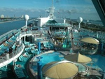 A view of the pool area and surrounding lounge chairs.